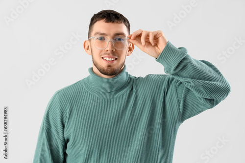 Young man in eyeglasses on ...
