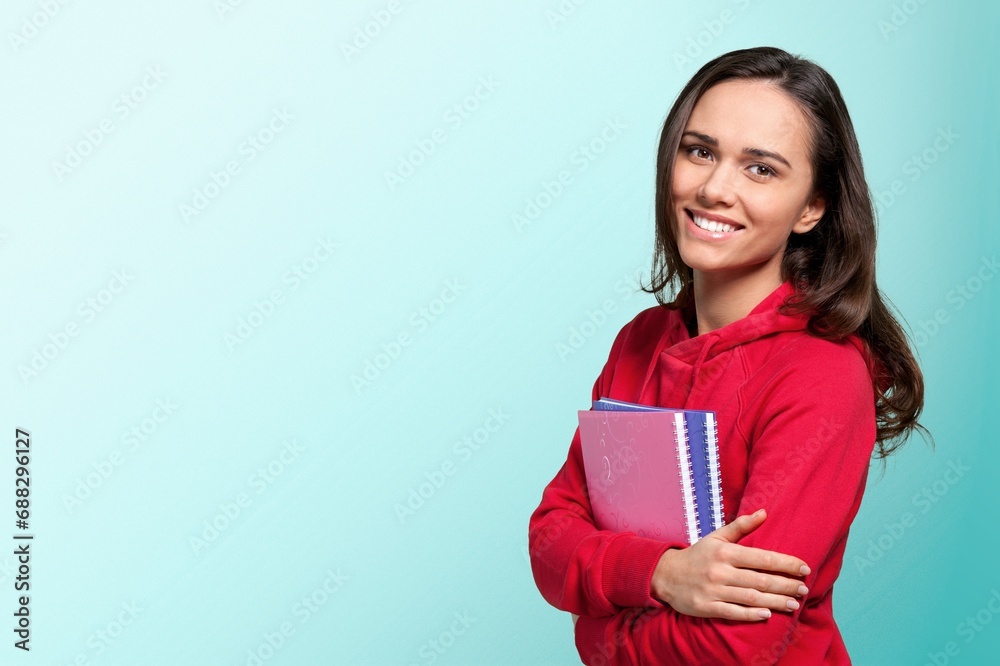 Young happy female student posing Young happy female student posing