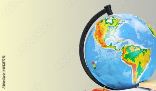 Part of a school world globe on background