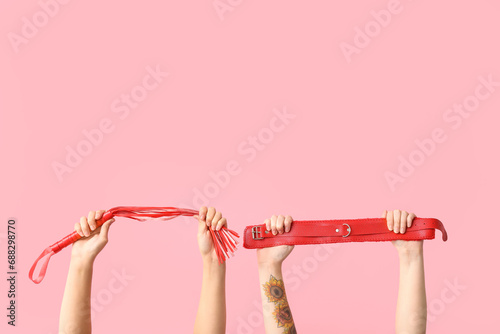 Female hands with sex toys ...