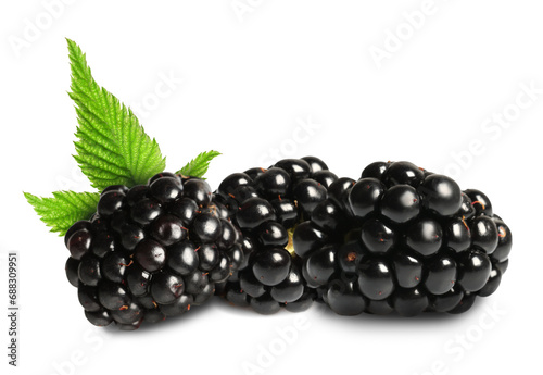 Tasty ripe blackberries and green leaves isolated on white