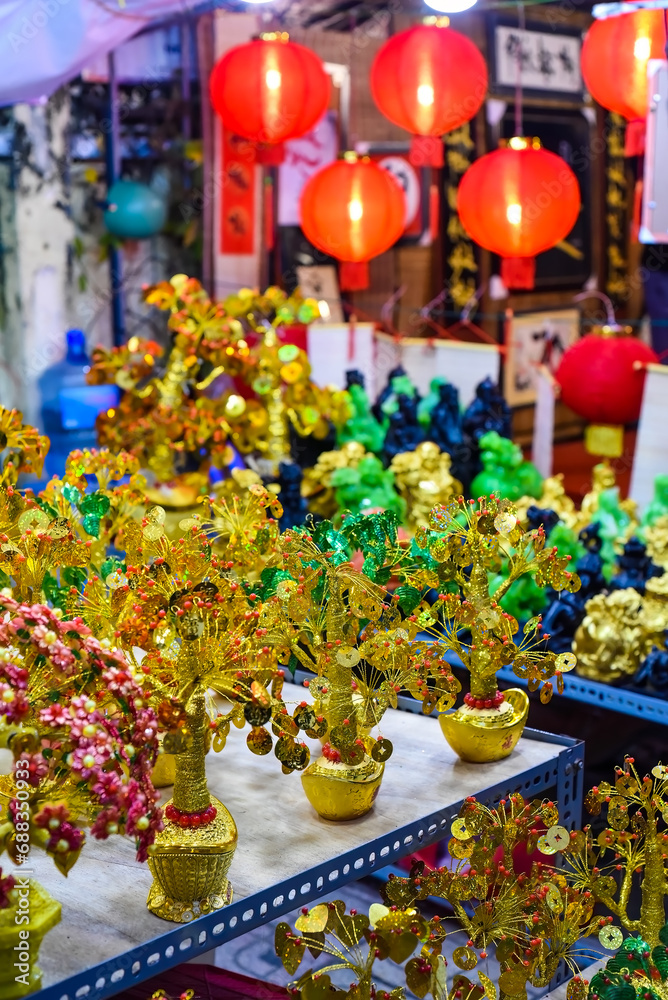 many decorations as symbol of wealth in the market for Tet Lunar New Year