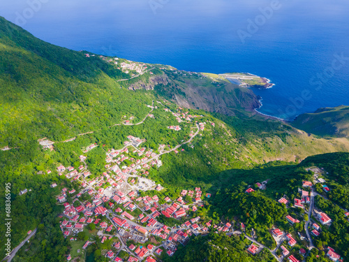 Windwardside historic town center aerial view, with Saba Juancho E. Yrausquin Airport SAB at the background in Saba, Caribbean Netherlands. 