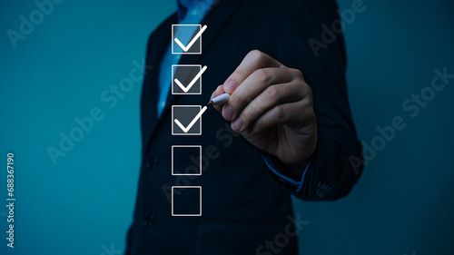 Businessman tick correct mark to approve document iso checklist icon.checkmark quality management quality assurance or QA and quality control or QC and improvement, Standardization and certification.