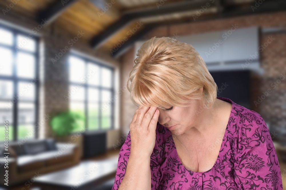 Unhappy old woman sit at home feeling depressed Unhappy old woman sit at home feeling depressed