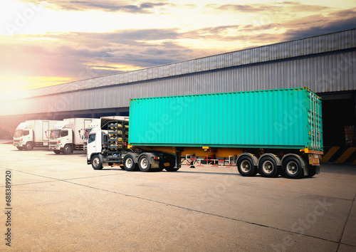 Semi Trailer Trucks on The Parking Lot at Warehouse. Trucks Loading at Dock Warehouse. Shipping Cargo Container Delivery Trucks. Distribution Warehouse. Freight Trucks Logistic, Cargo Transport.