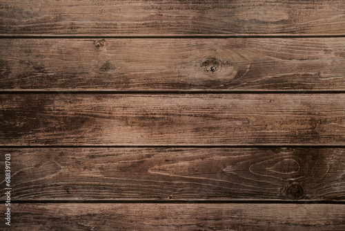 Background of brown horizontal unpainted old wooden planks