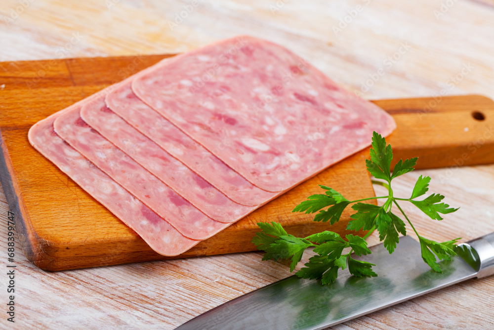 Image of slicing chopped ham from pork meat - obrazy, fototapety, plakaty 