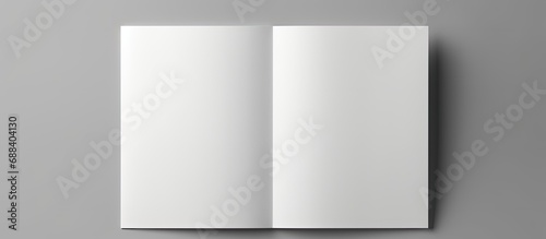 Back view of a blank white brochure mockup. Showing the cover of a leaflet. photo