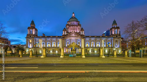 The imposing Belfast City Hall illuminated at dawn
