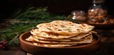 Turkish bread Gozleme on a wooden plate on a wooden background