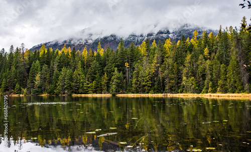 Fototapeta Naklejka Na Ścianę i Meble -  Still Pond In Glacier National Park