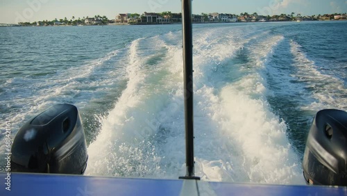 A trail of water behind the boat. Sailing on a boat or ship on the sea. slow motion photo
