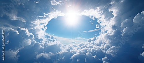 A hole in altocumulus clouds called a fallstreak, punch, or cloud hole. photo