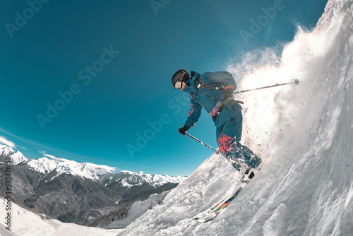 Картината върху платно Freeride professional skier jumps at off-piste ski slope