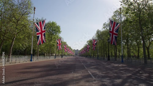 The Mall - Ceremonial Route And Roadway Lined With British Flags In London, UK. wide shot photo