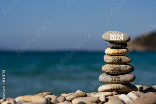 New Year 2024 change concept idea. There is a 2018-2024 change inscription on the stone tower.