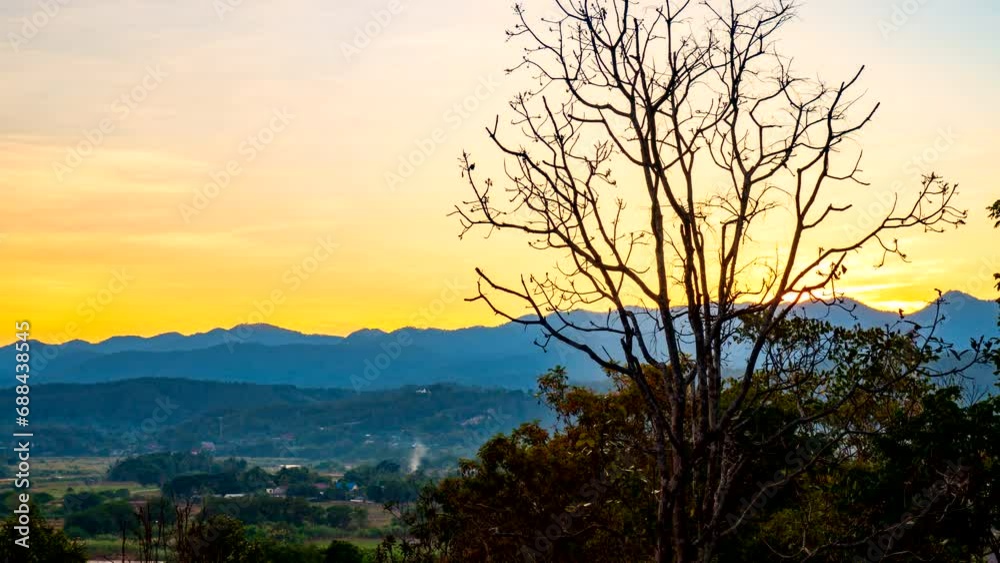 Time-lapse from a beautiful sunset until dusk sky with a leafless tree. Time-lapse from a beautiful sunset until dusk sky with a leafless tree.