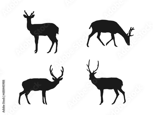 Set Of Black Deer Silhouettes. Collection of silhouettes of wild animals - the deer family. Set of wild deer silhouettes in flat style isolated on white background. Vector illustration.