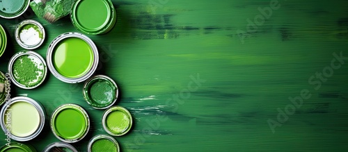 Fototapeta Naklejka Na Ścianę i Meble -  Selecting various shades of green paint for walls during home remodeling.