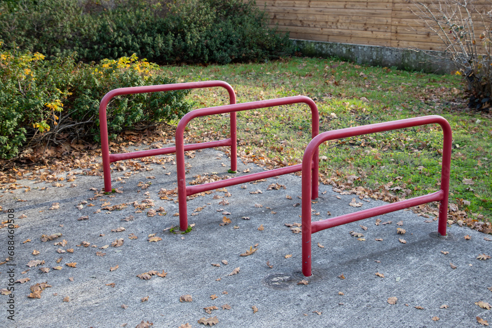 Empty bike parking steel in city park space for multiple bikes bicycles in environmentally friendly urban transport in town