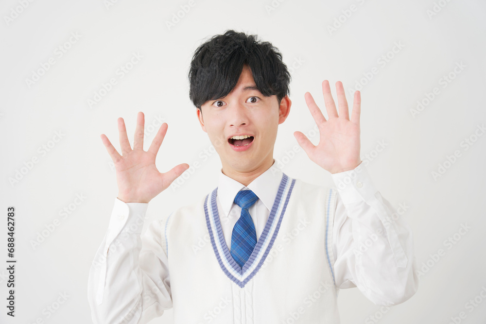 驚く男子高校生　白背景