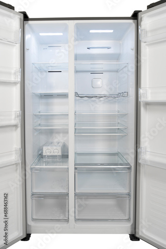 Empty refrigerator with open door Inside an empty, clean refrigerator, a refrigerator compartment after defrosting