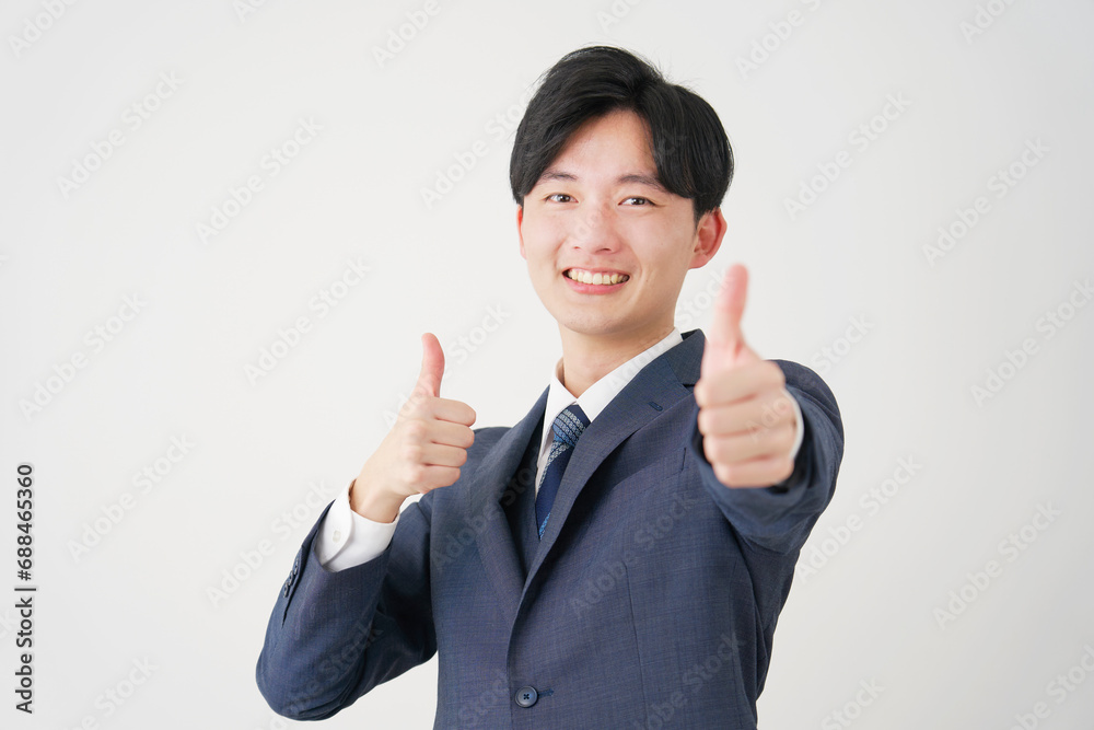 グッドポーズをするビジネスマン　白背景