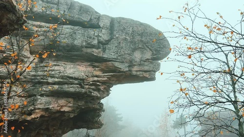 Wallpaper Mural Stone City in autumn. Bright foliage and autumn landscape. The natural landscape is a rock formation in Central Russia, the Urals. A natural monument. Ancient rocky folding in the Ural Mountains. 4K Torontodigital.ca