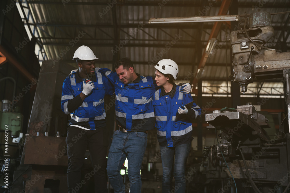Chemical leak and safety first concept. Assistant first aid male worker accident in industry factory