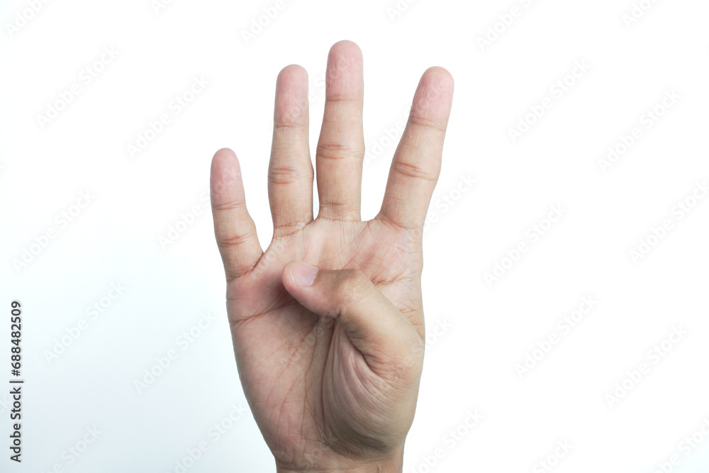 Hand on a white background. Hand Shows Four Fingers Hand on a white background. Hand Shows Four Fingers