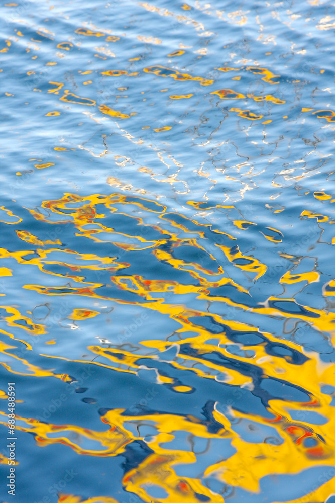 Abstract reflection of colors on the surface of water Abstract reflection of colors on the surface of water