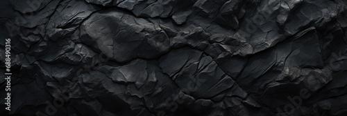 dark black rock texture wallpaper with light reflection background photo