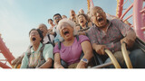 Happy senior people having fun on roller coaster at amusement park. Retirement concept