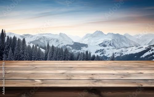 Empty wooden floor or table, display with winter theme background. Beautiful snowy landscape. Mountains and pines.