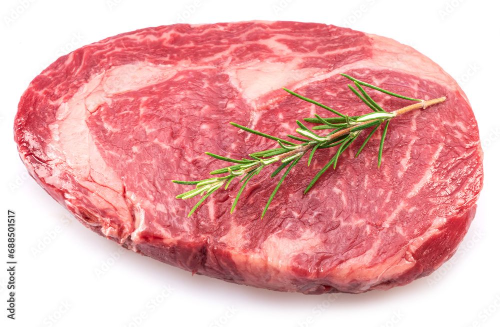 Raw ribeye steak isolated on white background. Closeup. Raw ribeye steak isolated on white background. Closeup.