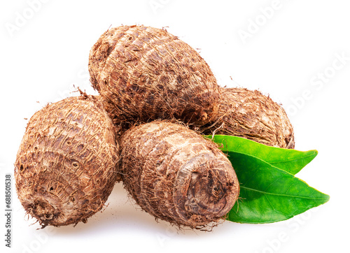 Raw organic eddoe or taro corms isolated on white background.