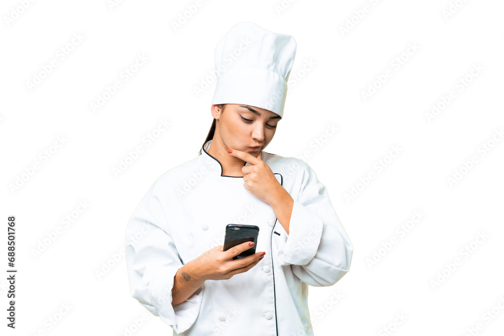Young woman Chef over isolated chroma key background thinking and sending a message Young woman Chef over isolated chroma key background thinking and sending a message