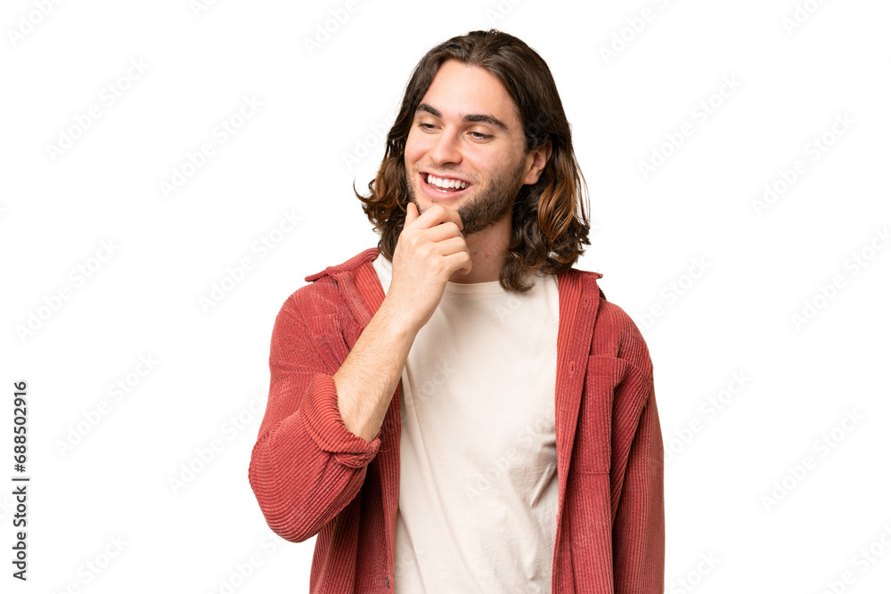 Young handsome man over isolated background looking to the side Young handsome man over isolated background looking to the side