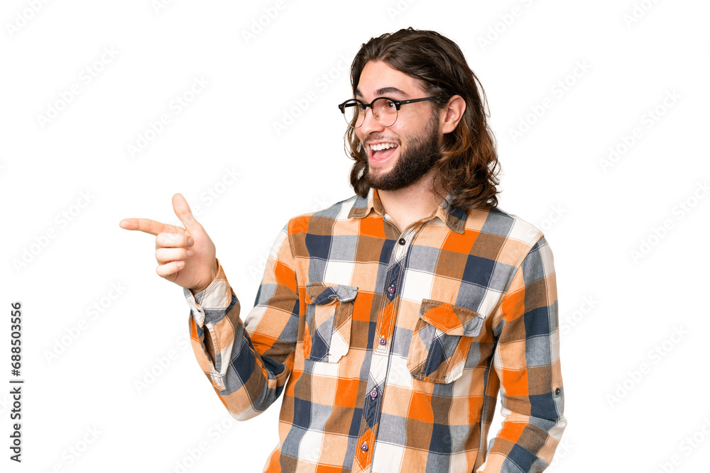 Young handsome man over isolated chroma key background pointing finger to the side and presenting a product Young handsome man over isolated chroma key background pointing finger to the side and presenting a product