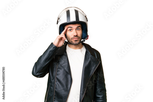 Young caucasian man with a motorcycle helmet over isolated chroma key background thinking an idea