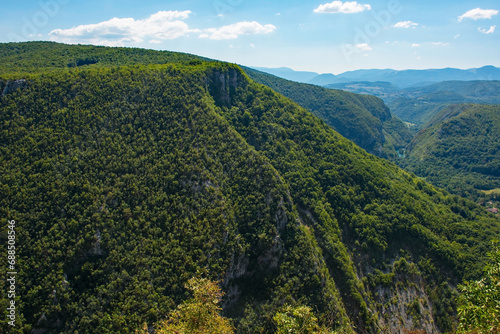 The summer landscape in the hills overlooking Martin Brod, Bihac, in the Una National Park. Una-Sana Canton, Federation of Bosnia and Herzegovina. Early September