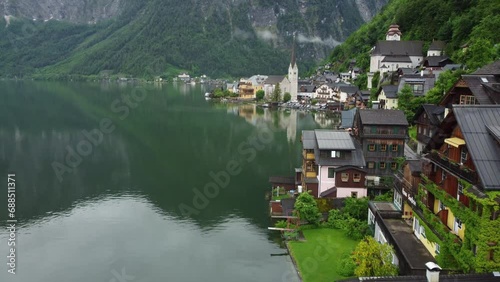 Wallpaper Mural Mystic Rainy Day in Hallstatt, Austria; Drone View of Evangelische Pfarrkirche Lutheran Church Amidst Austrian Architecture and Majestic Mountains. Enchanting Atmosphere for Travel and History Videos Torontodigital.ca
