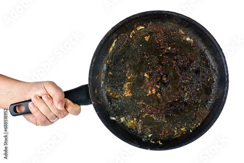 Foto Hand hold frying pan with the leftover grease isolated on a white background