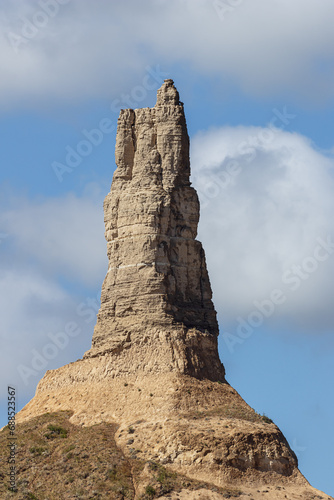 Close up from the east of Chimney Rock, a geological rock formation in the North Platte River valley photo