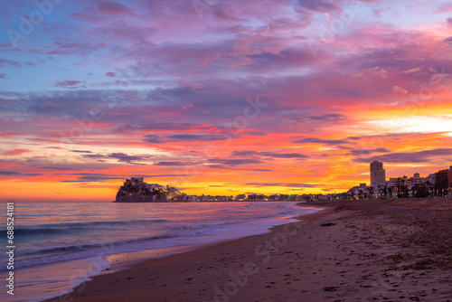 Sunset on Peniscola beach in Spain