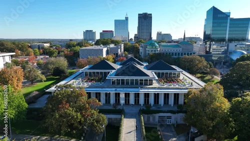 North Carolina legislative building and downtown Raleigh skyline with capitol complex. Aerial descending shot. photo