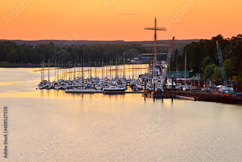 Yachts in port. Sunset on Aland Islands. Finland photo
