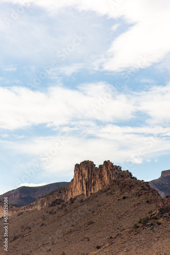 Low-angle view of rock formations against the sky in Setif, Algeria.