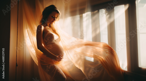 intimate moment with pregnant young woman touching her enlarged belly in front of sunny window